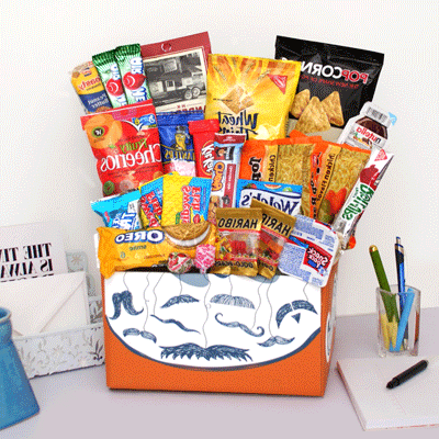 Organige box with mustaches on it displaying what comes in the carepackage